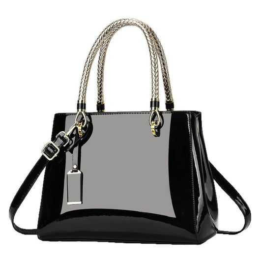 Black synthetic PU patent leather handbag with gold chain straps and high-gloss mirror-like finish