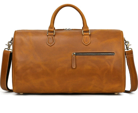 Full-grain cowhide leather duffle bag by Avenue — rich tan colour showcasing natural leather texture and patina