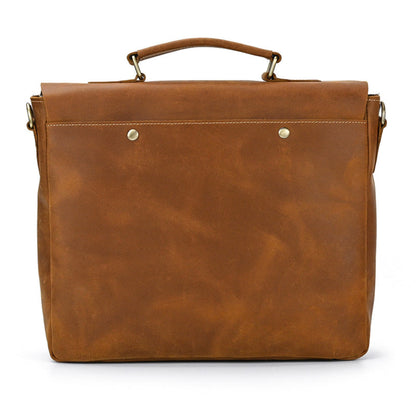Men's Crazy Horse Leather Crossbody Bag – Top Layer Cowhide Messenger Bag in Brown, back view on white background showing clean leather panel, brass stud detailing, top handle and brass strap attachment hooks | Avenue