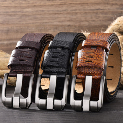 Men's double-layer cowhide black, brown and light brown leather belts with silver buckles on wooden surface showing colour contrast | Avenue