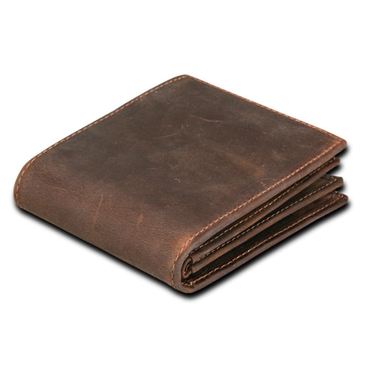 Men's RFID Blocking Crazy-Horse Leather Wallet in Brown – Side Angled View Showing Folds | Avenue