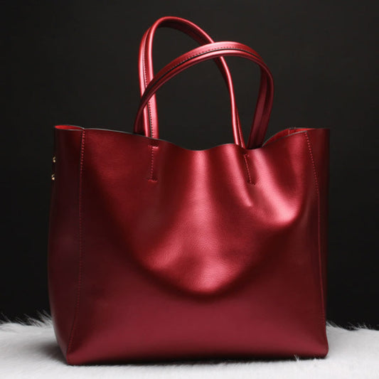 Women's genuine cowhide leather shoulder bag in wine red – handbag and crossbody with single shoulder strap, top handles, gold hardware detail, and spacious open-top design – Avenue