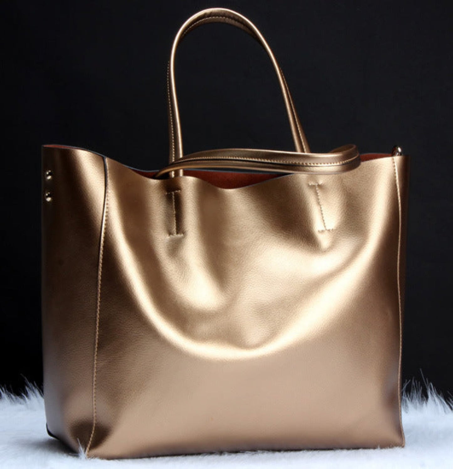 Women's genuine cowhide leather shoulder bag in bronze – handbag and crossbody with single shoulder strap, top handles, gold hardware detail, and spacious open-top design – Avenue