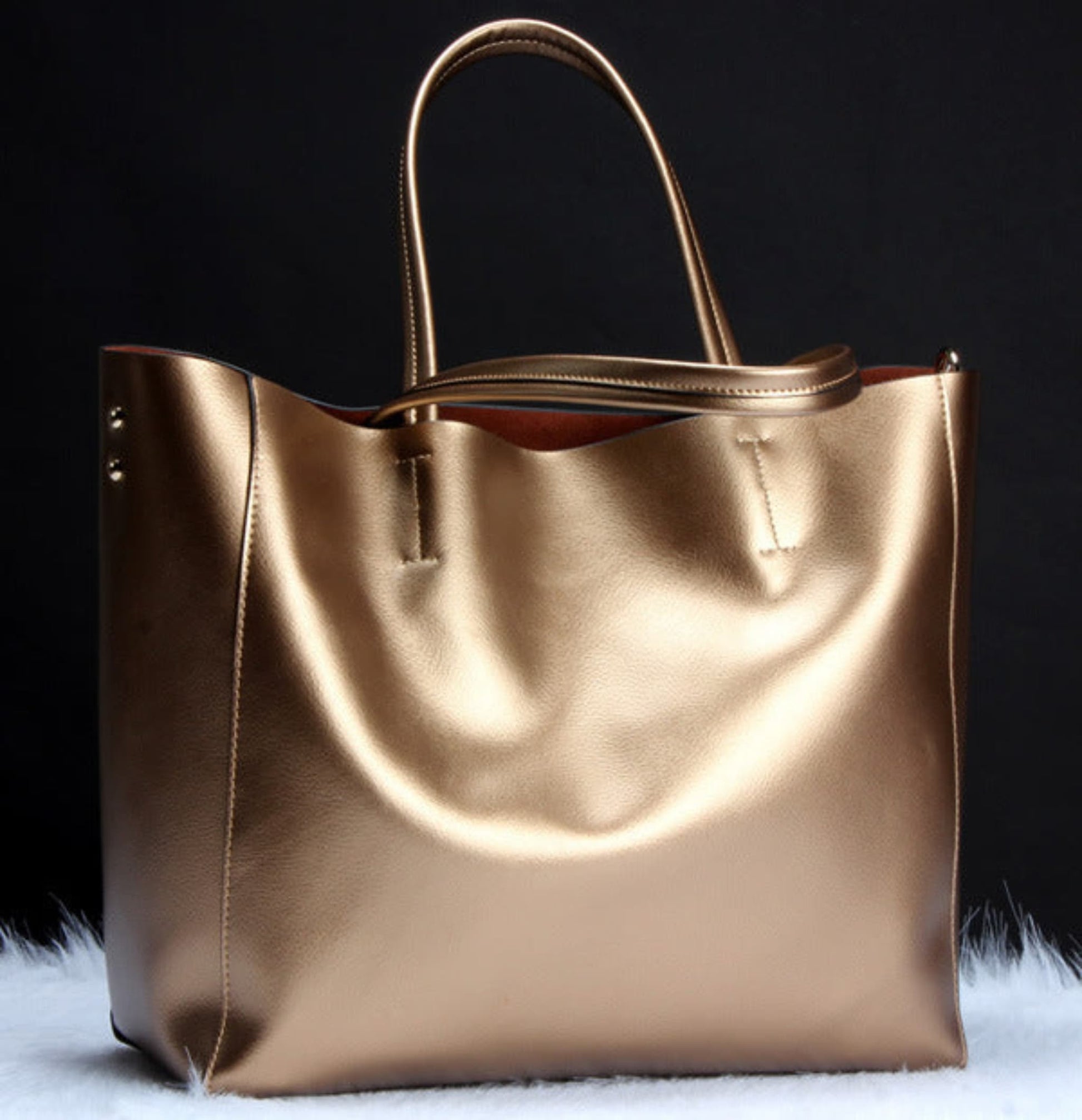 Women's genuine cowhide leather shoulder bag in bronze – handbag and crossbody with single shoulder strap, top handles, gold hardware detail, and spacious open-top design – Avenue