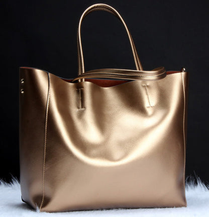 Women's genuine cowhide leather shoulder bag in bronze – handbag and crossbody with single shoulder strap, top handles, gold hardware detail, and spacious open-top design – Avenue