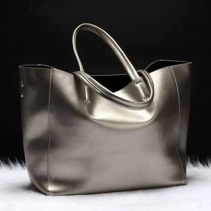 Women's genuine cowhide leather shoulder bag in silver – handbag and crossbody with single shoulder strap, top handles, gold hardware detail, and spacious open-top design – Avenue