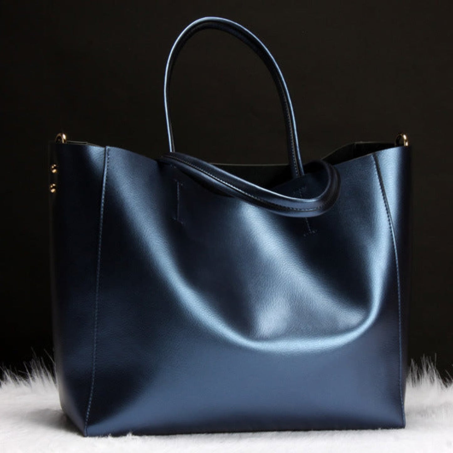 Women's genuine cowhide leather shoulder bag in blue – handbag and crossbody with single shoulder strap, top handles, gold hardware detail, and spacious open-top design – Avenue