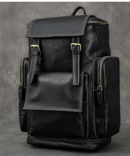 Retro crazy horse leather Men's laptop backpack large capacity in black on grey background – front view | Avenue