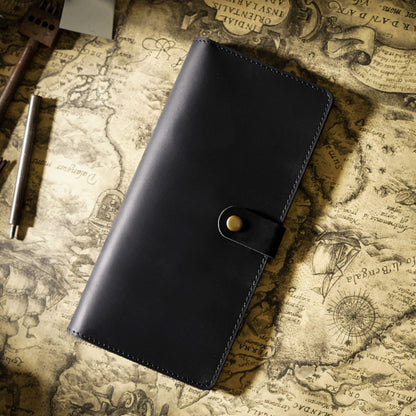 Avenue Retro Crazy Horse Leather Long Wallet in Black – Unisex Genuine Leather Wallet with Brass Snap Closure, styled on a vintage world map with leather crafting tools