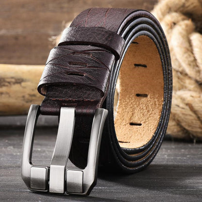 Men's double-layer cowhide brown leather belt with silver buckle on wooden surface | Avenue