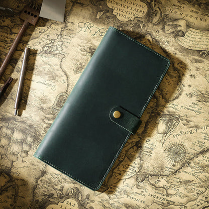 Avenue Retro Crazy Horse Leather Long Wallet in Dark Green – Unisex Genuine Leather Wallet with Brass Snap Closure, styled on a vintage world map with leather crafting tools