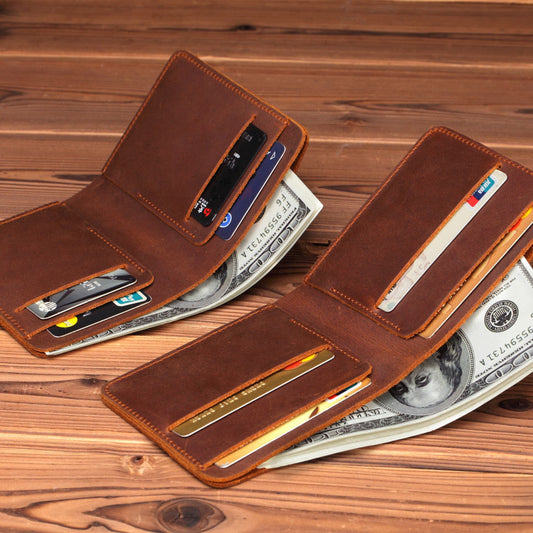 Men's Handmade Crazy Horse Leather Wallet in brown — open view showing multiple card slots and cash compartments, displayed on a wooden surface | Avenue