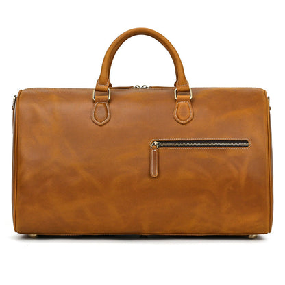 Avenue Retro Crazy Horse Leather Travel Bag in Light Brown — front view with gold zipper pocket and dual top handles — genuine leather duffle bag — white background