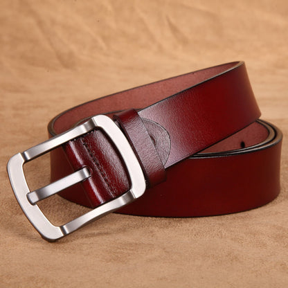 Avenue Men's Genuine Cowhide Leather Retro Belt in Brown with brushed gunmetal pin buckle, rolled view on tan leather background