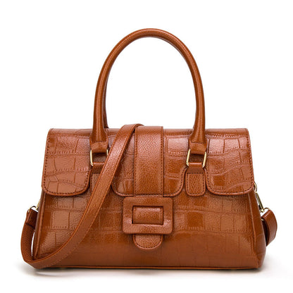 Women's Crocodile Pattern Leather Handbag in Brown with Top Handles and Crossbody Strap – Front View | Avenue