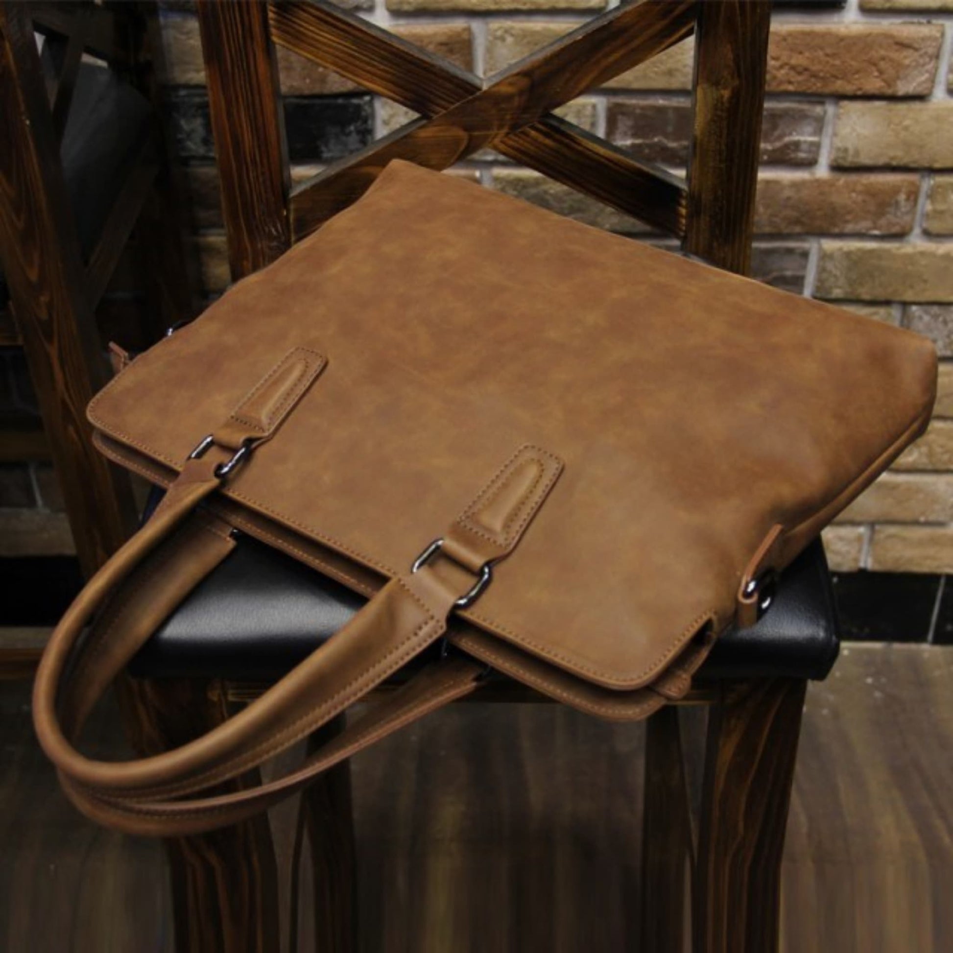 Avenue Crazy Horse Leather Men's Handbag & Laptop Bag – Coffee Vintage Shoulder Bag with Silver Buckles, Back View on Wooden Stand