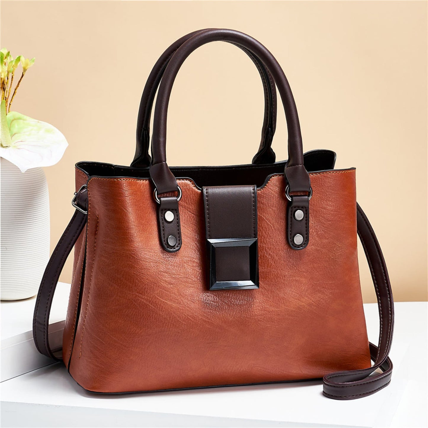 woMen's lychee pattern structured PU leather handbag in Earthy Yellow with brown accents on light background | Avenue