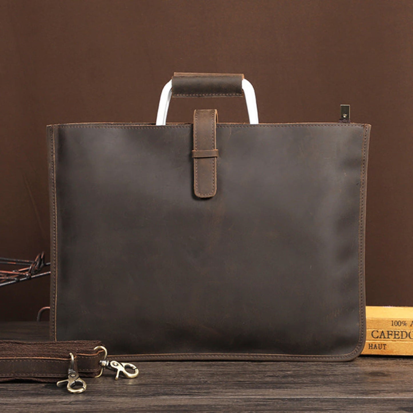 Avenue Men's Crazy Horse Leather Briefcase Coffee 6004 — Front View with Aluminium Handle and Detachable Shoulder Strap Lying on Floor