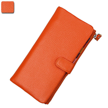 Women's RFID blocking genuine cowhide long leather wallet in orange with zipper and buckle closure front view | Avenue