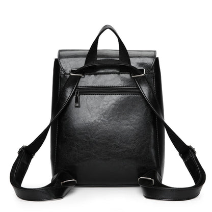 Women's PU Leather Flap Backpack in Black – Back View Showing Zip Pocket, Dual Adjustable Backpack Straps & Short Top Handle | Avenue