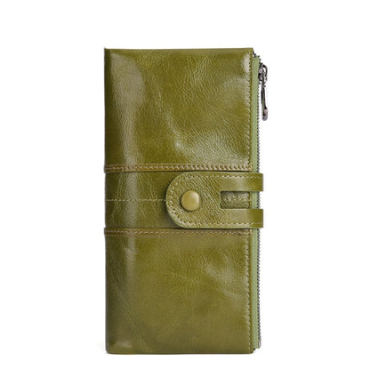 Women's RFID Long Leather Wallet first layer cowhide in Green with Fastening Strap and Zipper — upright view | Avenue