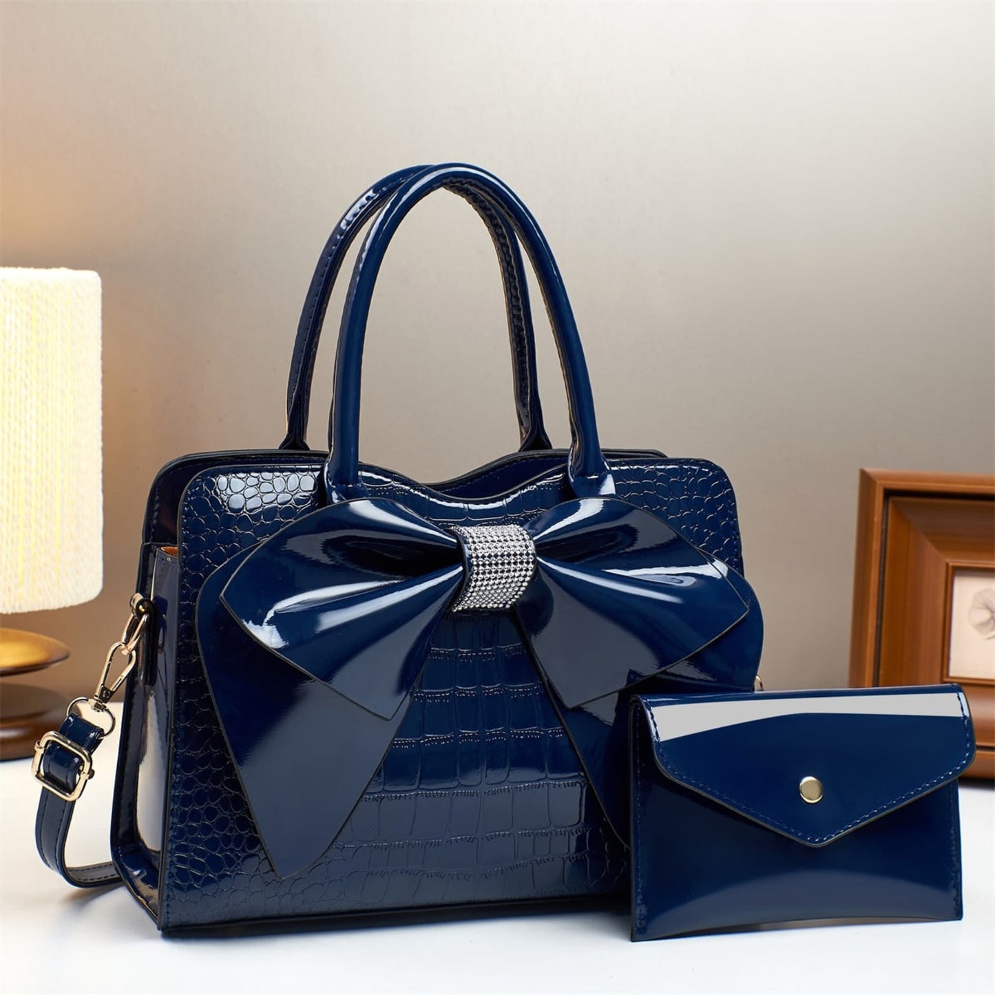 blue patent leather bow bucket bag and matching wallet | Avenue