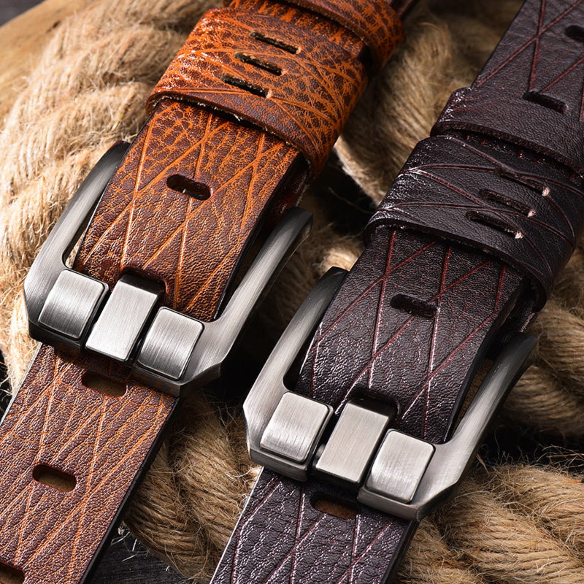 Men's double-layer cowhide leather straps with metal buckles in brown and light brown showing colour contrast on a textured background | Avenue