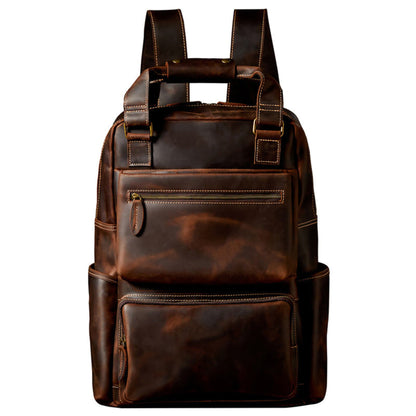 Unisex handmade retro crazy horse leather oversized backpack in brown, front view showing double shoulder straps, antique brass zipper hardware and multi-pocket design | Avenue