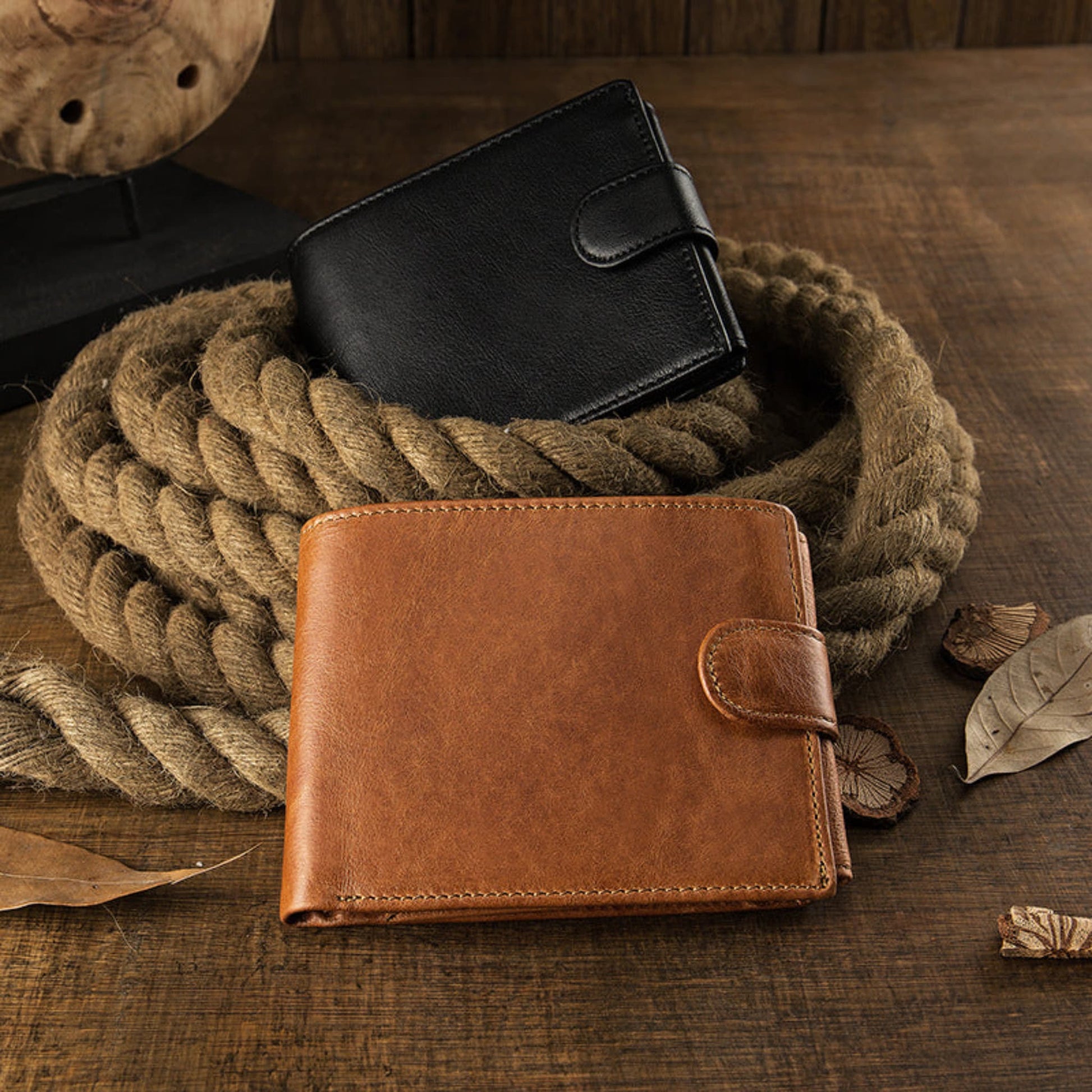 Avenue Men's Short Leather Wallet – Genuine Cowhide in Brown and Black with snap closure, displayed on rustic rope and wooden surface