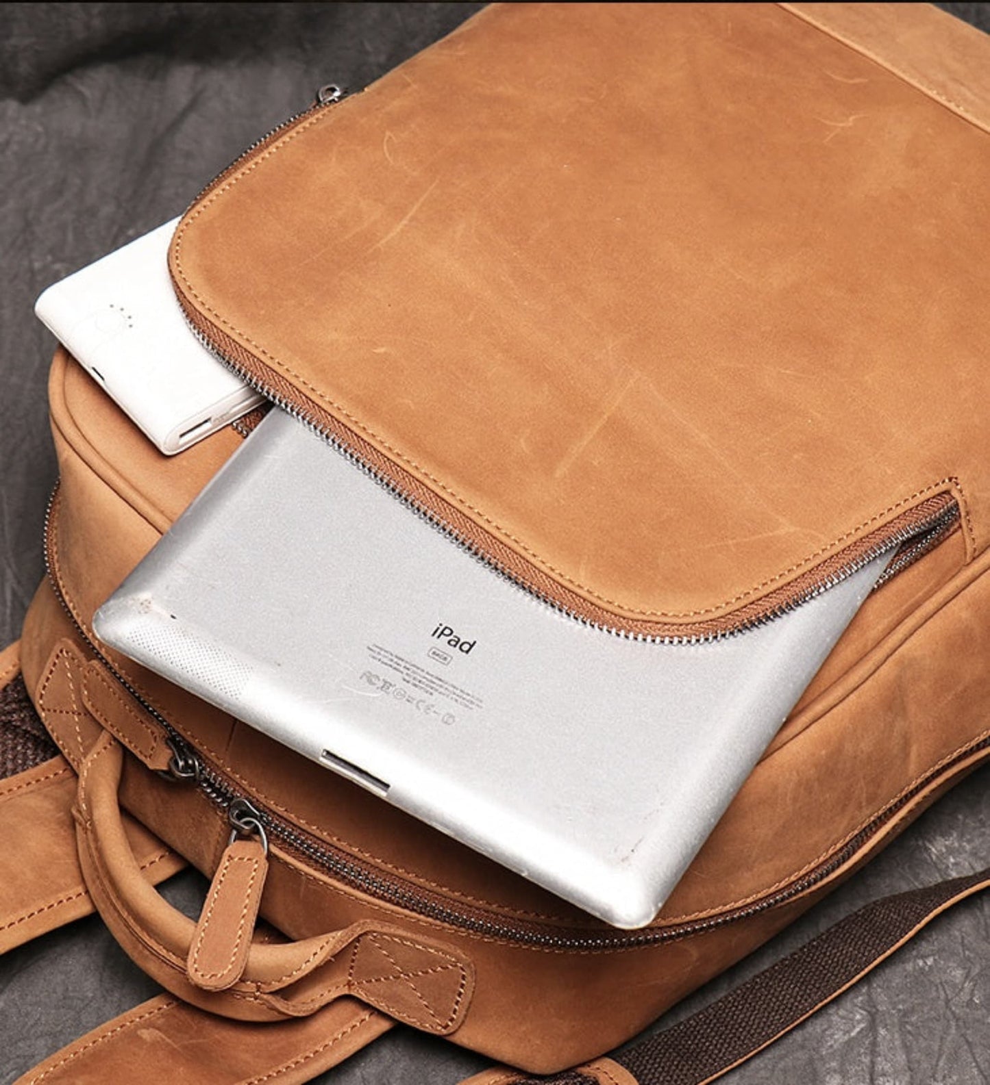 Avenue Brown Yellow Retro Crazy Horse leather backpack for men – tablet and iPad sleeve compartment detail showing easy-access zipper pocket