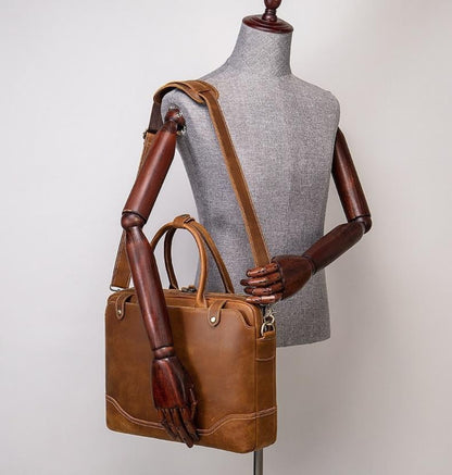 Avenue Crazy Horse Leather Men's Laptop Briefcase — coffee, worn on shoulder on mannequin, shoulder strap, dual handles, contrast stitching, retro vintage style