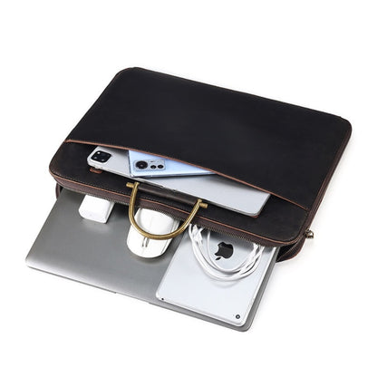 Avenue Crazy Horse Genuine Leather Briefcase for Men – Open view in 2121 Coffee showing spacious interior capacity with laptop, iPad, smartphone, charger, earphones, and cables, featuring antique brass top handle and zipper closure on white background