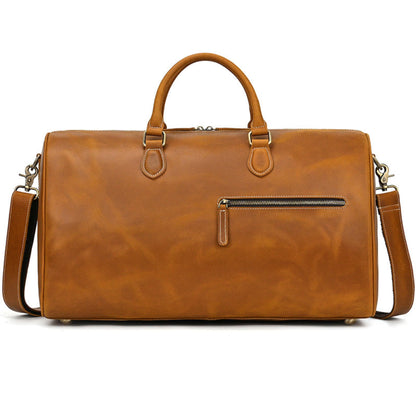 Avenue Retro Crazy Horse Leather Travel Bag in Light Brown — front view with detachable shoulder strap, gold zipper pocket and dual top handles — genuine leather duffle bag — white background