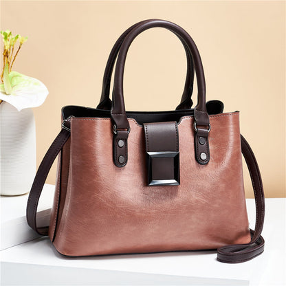 woMen's lychee pattern structured PU leather handbag in Apricot with brown accents on light background | Avenue