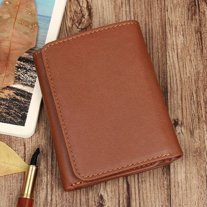 Avenue Men's RFID Blocking Leather Wallet – Retro Anti-Scanning Bifold in Brownish Yellow, front view on wooden surface